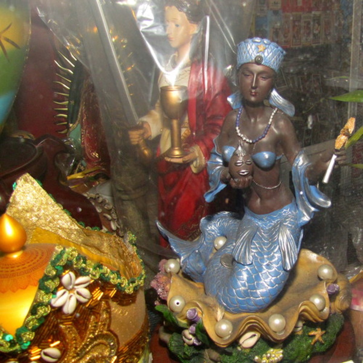 <p>Combines two religious traditions into something distinctly new, while containing traits of both</p>