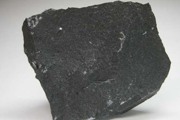 <p>An igneous rock with fine crystals that <strong>cannot</strong> be seen by the naked eye. (i.e. andesite, basalt)</p>