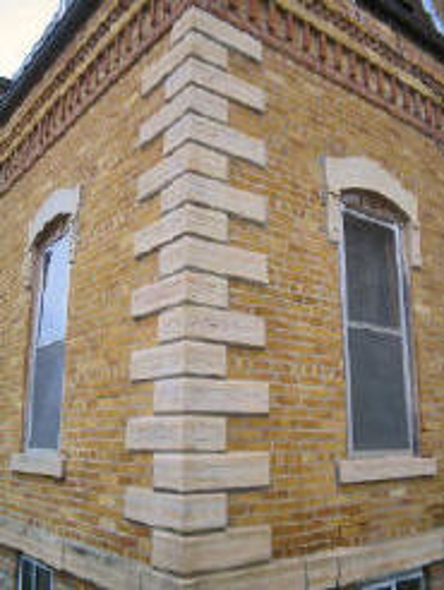 <p>The <span class="bgY">corner stones</span> at the angles of buildings, usually rusticated so as to project from the normal surface of the wall.</p>