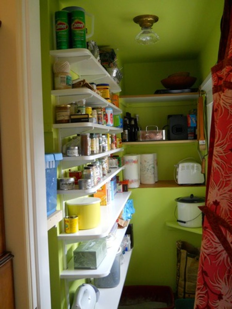 <p>a small room or large cupboard in a house where food is kept</p>
