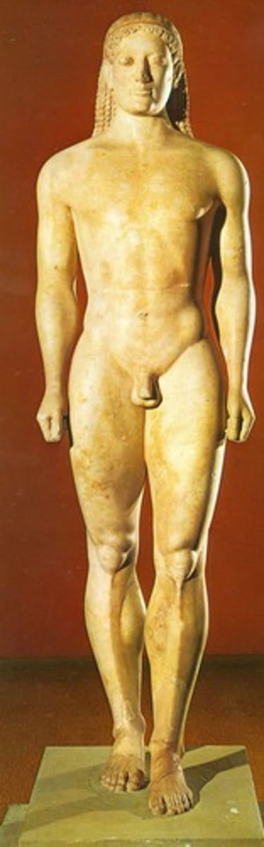 <p>nahý, stojící mladík</p><p>velký vliv Egypta</p><p>• vzpřímené sochy bez pohybu</p><p>• frontálnost</p><p>• strnulost</p><p>• idealizace nahého těla</p><p>• těžiště na obou nohou, ruce podél těla</p><p>• příznačné nakročení</p><p>• archaický úsměv</p><p><strong>Kúros z Anavyssos</strong></p>