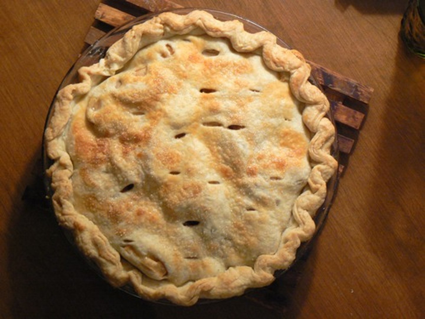 <p>a baked dish of fruit, or meat and vegetables, typically with a top and base of pastry (n)</p>