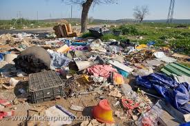 The contamination of land by both solid and hazardous waste