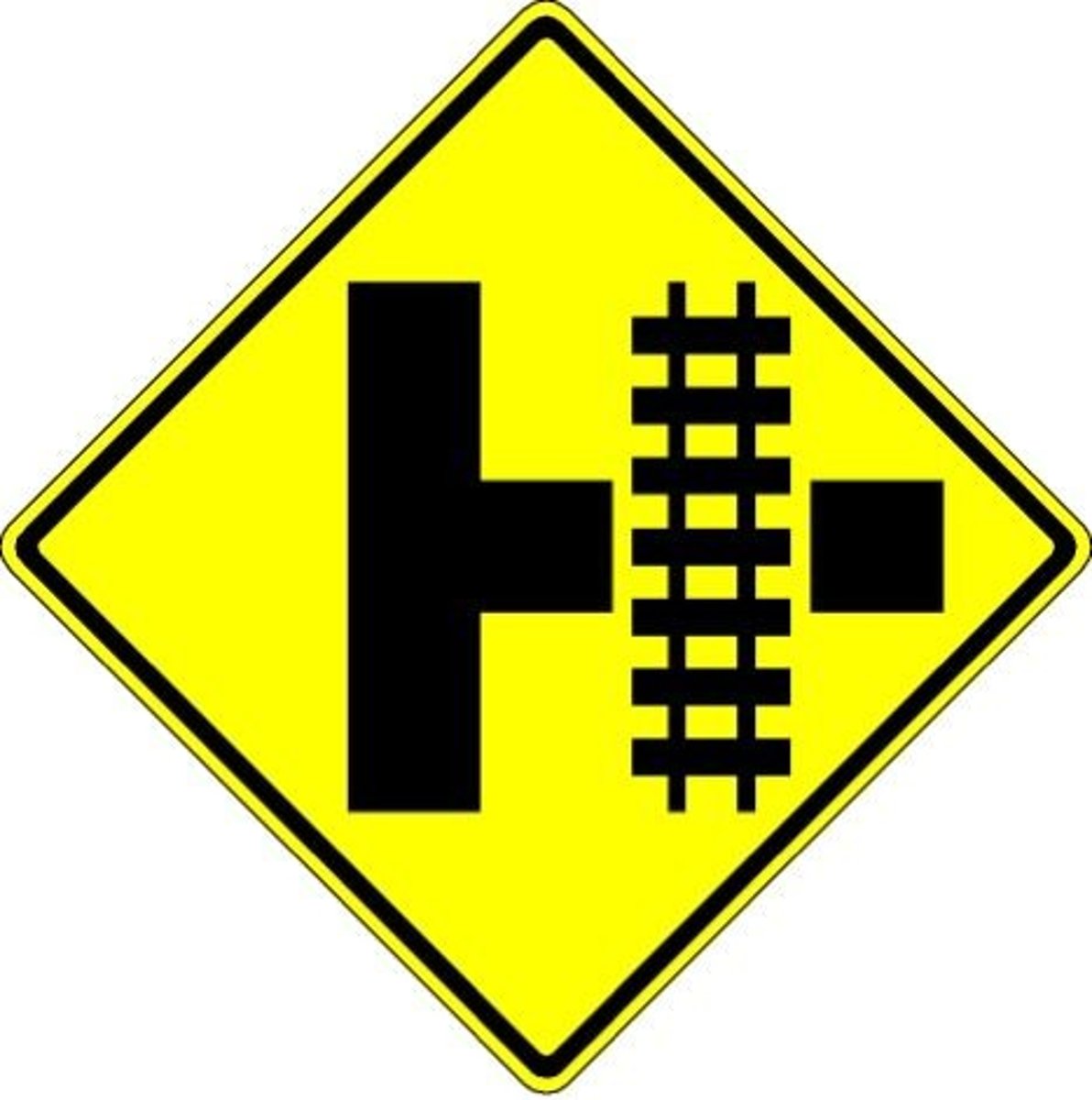 <p>A side road at a railroad crossing.</p>