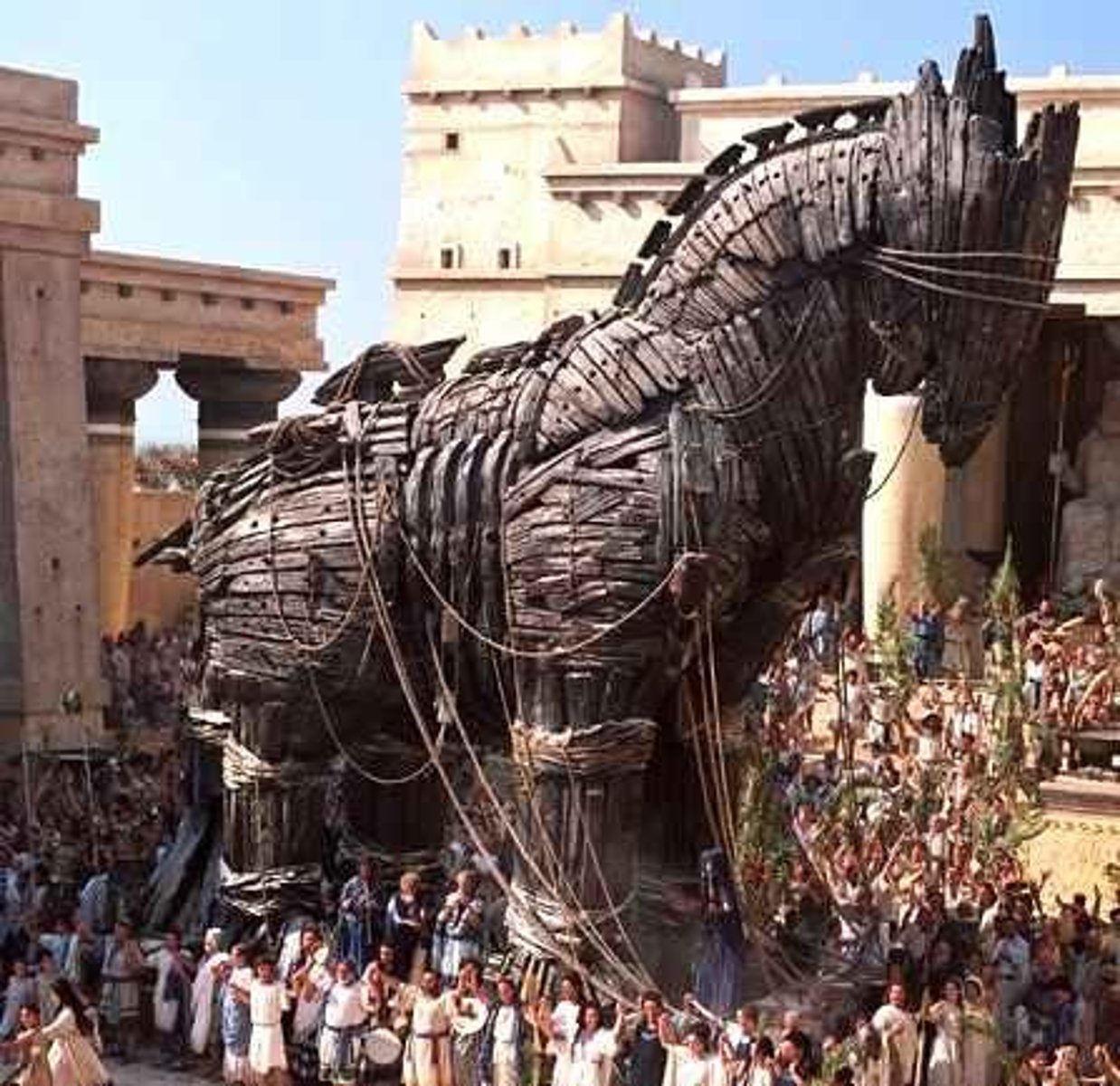<p>build enormous wooden horse, hide Greek soldiers inside and push horse to Troy's city gates.</p>