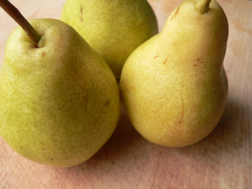 round, thicker shape at their bottoms, with a narrower piece and a small stem towards the top. They range in outside color from green-light green-yellow-red tones.