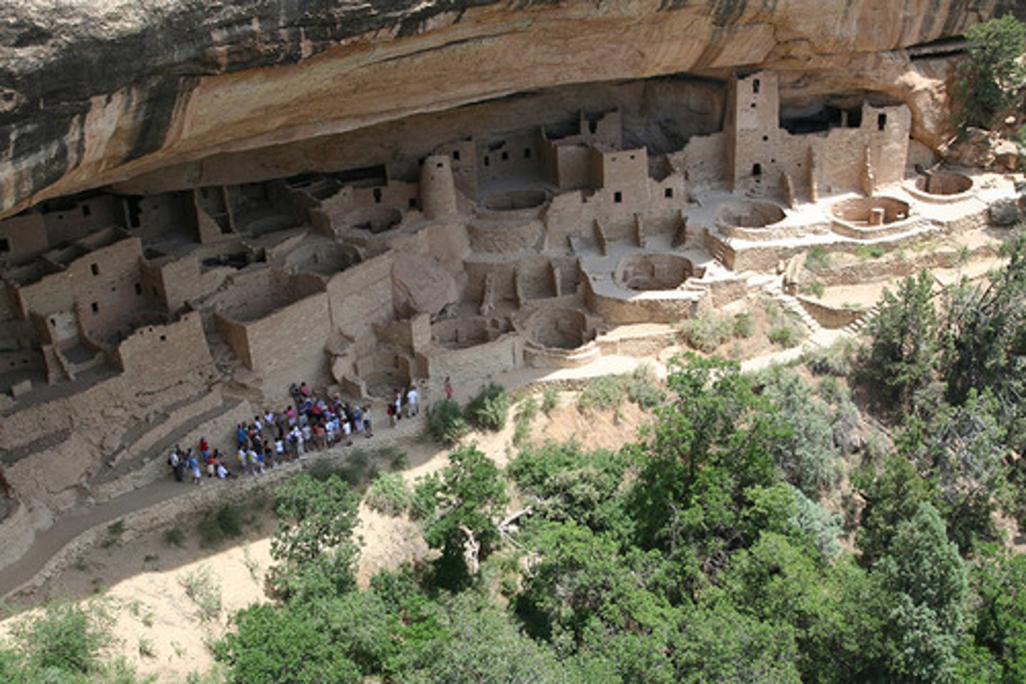 <p>Form- Carved into cliffs, difficult to access. Hollowed prior, started with adobe buildings, current are masonry with mortar. High elevation= Cold Nights/ Boiling Days, extremely dry. Lined on top of mesas prior, mound under cliffs to protect from weather. <br><br>Function- The shield from weather and guard from attacks. Kivas for healing ritural or rain, crops and harvest. Sacred living space. <br><br>Content- 150 rooms, varies 1-4 stories round open Kivas for rituals. Murals: plastered wall w/ murals painted atop display geometric designs, animals and plants, painted with natural pigments. Design similar to those painted by <br>Pueblo-ans on pottery (ancestory).<br><br>Context: Anasazi are now Ancestral Pueblo-ans. Built by Anasazi around 450 C.E., Abandoned by 1100-1200 BCE due to extensive drought (1276-1299) and Social/Political disbandment. Unlike Inca, Aztecs, or Maya, Ancestral Pueblo-ans were egalitarian, without royal higher class</p>