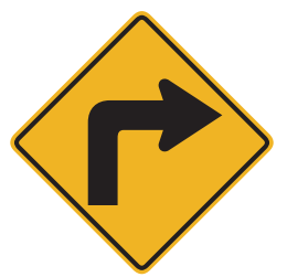 The road will make a sharp turn to the right. Slow your speed and do not pass other vehicles. 