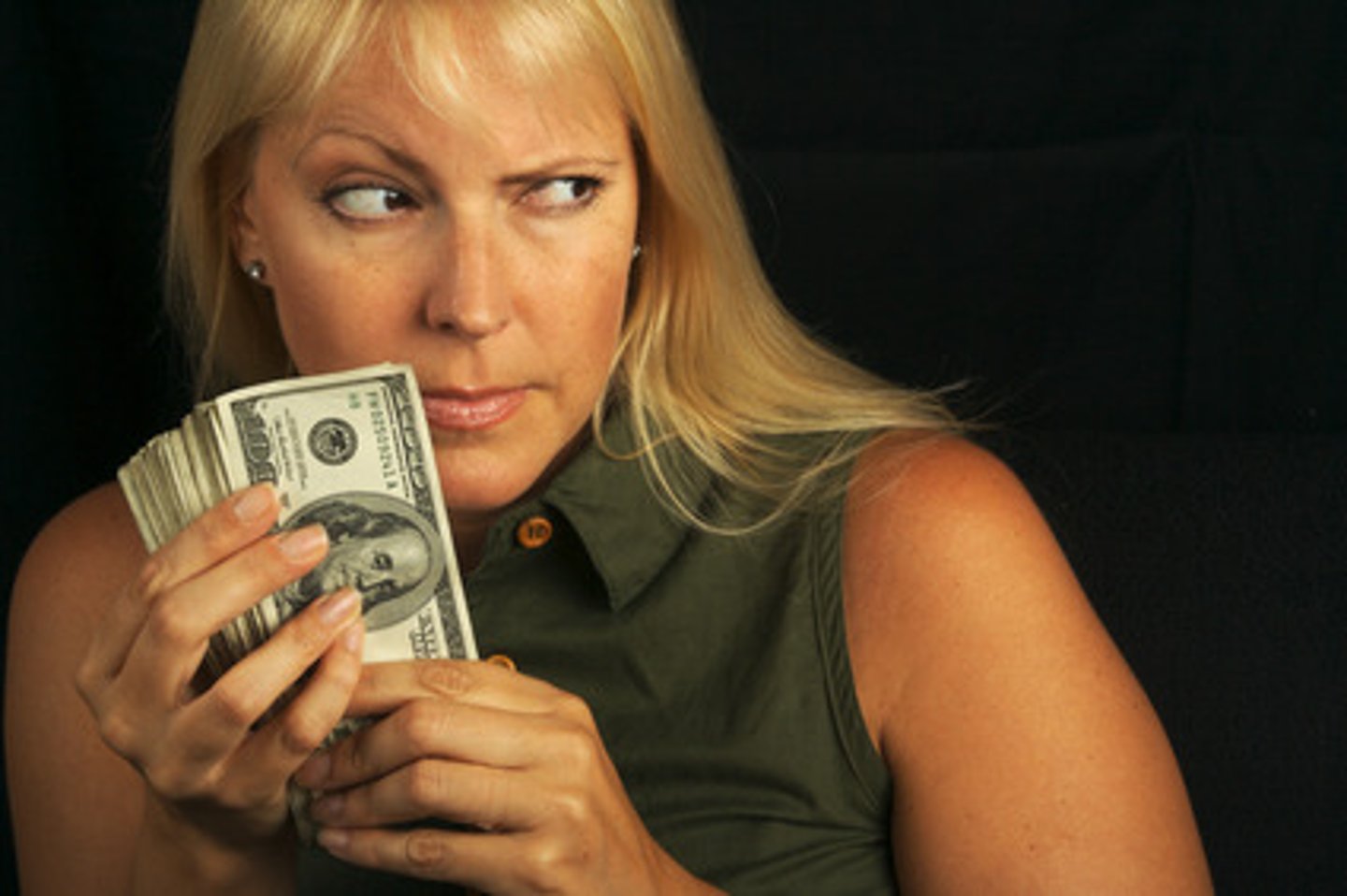 <p>someone who is unwilling to spend money or share resources, often to the point of being unreasonably frugal or selfish<br><br>"She's stingy with her time and rarely helps others with their work."</p>