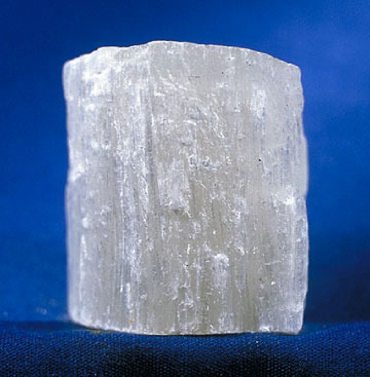 <p>consisting of or characterized by fibers (gypsum(</p>
