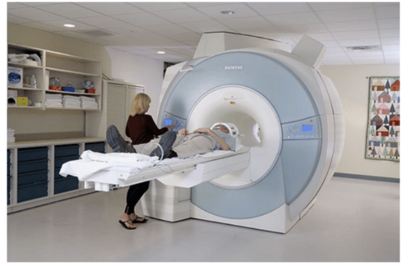 <p>brain-imaging method using radio waves and magnetic fields of the body to produce detailed images of the brain</p><p></p><ol><li><p><strong>Strong Magnetic Field</strong></p><ul><li><p>You lie inside a large magnet. This magnetic field causes <strong>hydrogen protons</strong> (found abundantly in water and fat) in your body to align like tiny compass needles.</p></li></ul></li><li><p><strong>Radiofrequency Pulse</strong></p><ul><li><p>A burst of radio waves is sent into your body, knocking those aligned protons out of position.</p></li></ul></li><li><p><strong>Relaxation &amp; Signal Emission</strong></p><ul><li><p>When the pulse stops, the protons <strong>relax</strong> back to their original alignment. As they do, they emit <strong>radio signals</strong>.</p></li></ul></li><li><p><strong>Signal Detection &amp; Image Formation</strong></p></li></ol><ul><li><p>These signals are picked up by receiver coils and processed by a computer to create detailed cross-sectional images of your body.</p></li></ul><p></p>