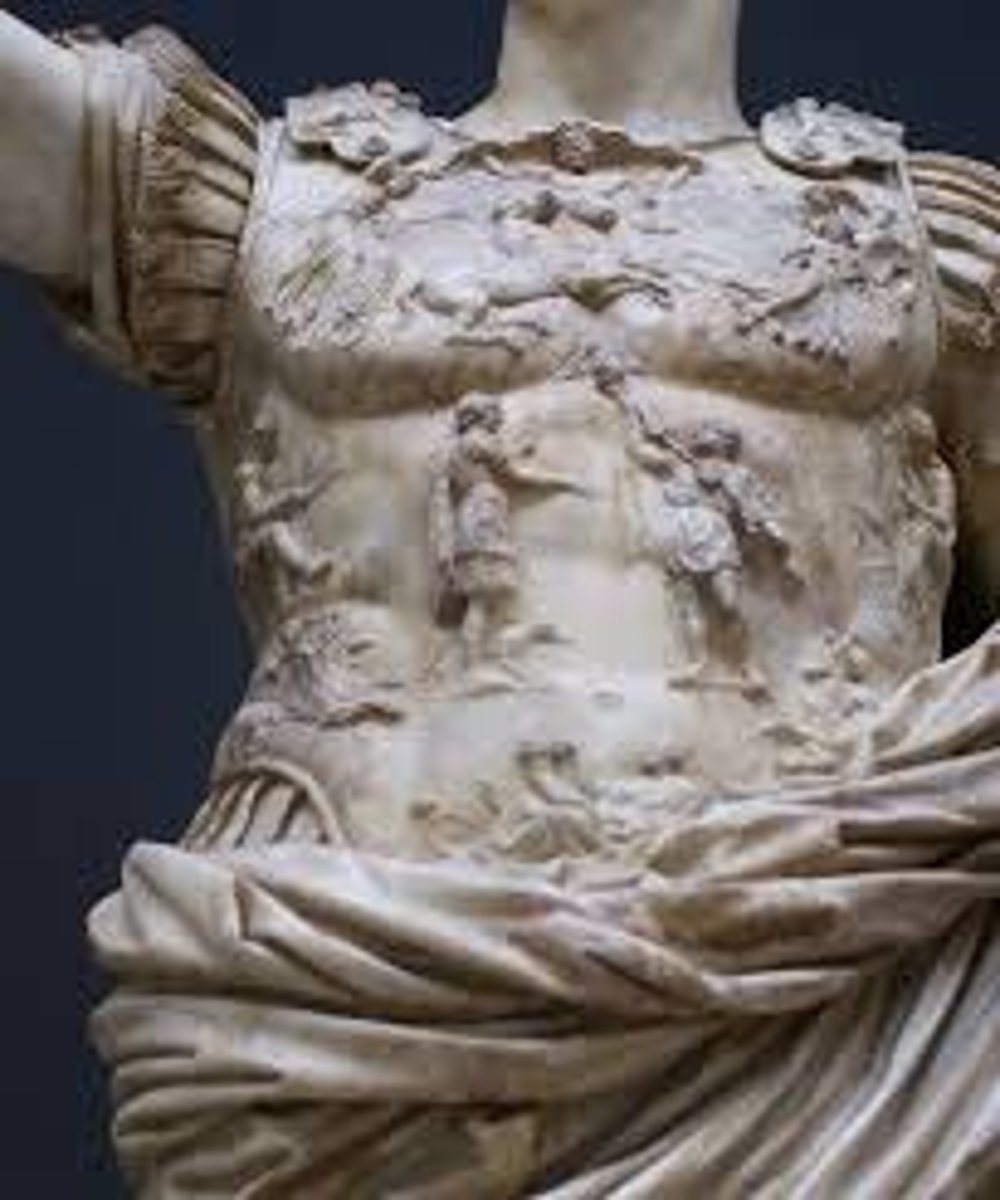 <p>- Epaulettes: sphinxes</p><p>- Center: Parthians returning the standard to a Roman (Mars Ultor? Tiberius?)</p><p>- Top: Caelus, Aurora, and Luna</p><p>- Center left and right: subjugated peoples Apollo and Artemis</p><p>- Bottom: Tellus</p>