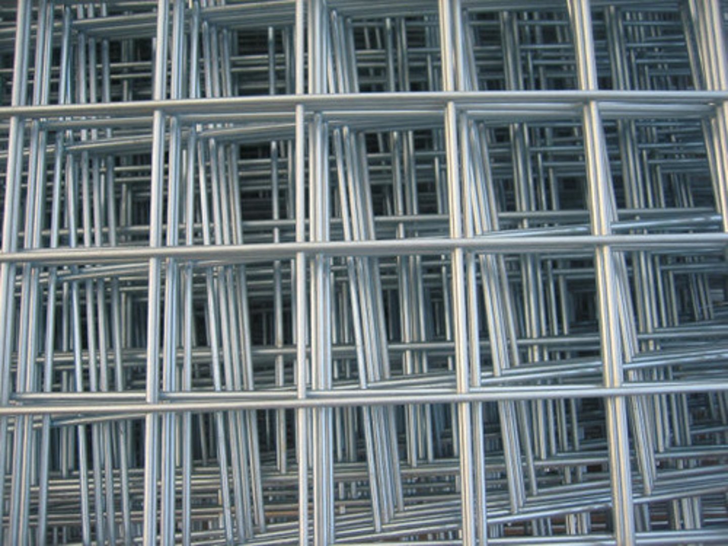 <p>a grid of longitudinal and transverse steel wires or bars welded together at all points of intersection</p>
