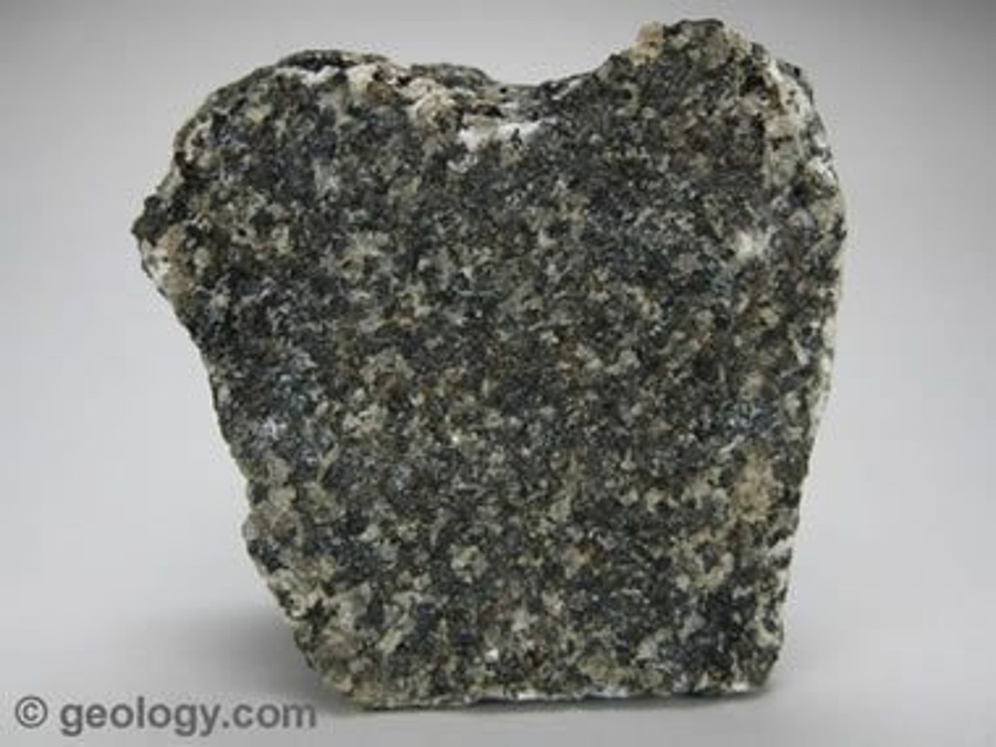 <p>coarse-grained, dark-colored, intrusive <strong>igneous rock</strong>. It is usually black or dark green in color and composed mainly of the minerals plagioclase and augite. It is the most abundant <strong>rock</strong> in the deep oceanic crust.</p>