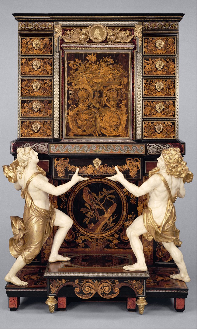 <p><span><strong>André-Charles Boulle, Cabinet on Stand</strong>, <em>c. </em>1675–80. Oakveneered with pewter, brass, tortoiseshell, horn, ebony, ivory, and&nbsp;wood marquetry; bronze mounts; figures of painted and gilded oak; drawers of snakewood, 7&nbsp;ft. 6½ in.&nbsp;× 5 ft. 9½ in. × 26¼ in. (2.3&nbsp;m × 1.77 m × 66.7 cm). J. Paul Getty Museum, Los Angeles, California</span></p>