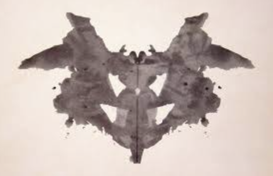 Showing ambiguous inkblots where your unconscious guides you when interpreting the inkblots. Used to examine a person's personality characteristics and emotional functioning.

