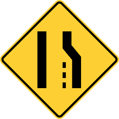 26\. What is the name of this sign?

\
Railroad Crossing

Merging

Reduction in Lane

Yield