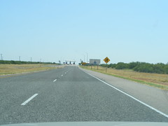 The property of a good whereby one person's use diminishes other people's use. (For example congested roads are, while uncongested toll roads are not).