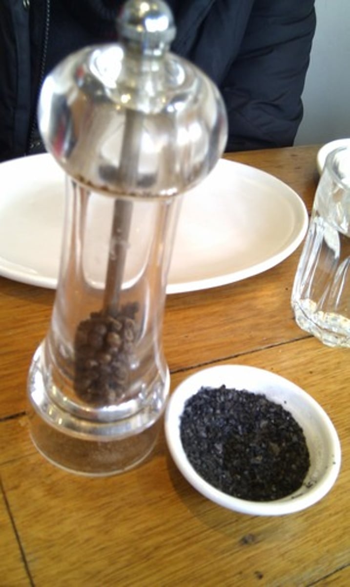 <p>A spice that tastes a little hot and is used to add flavor to food.</p>