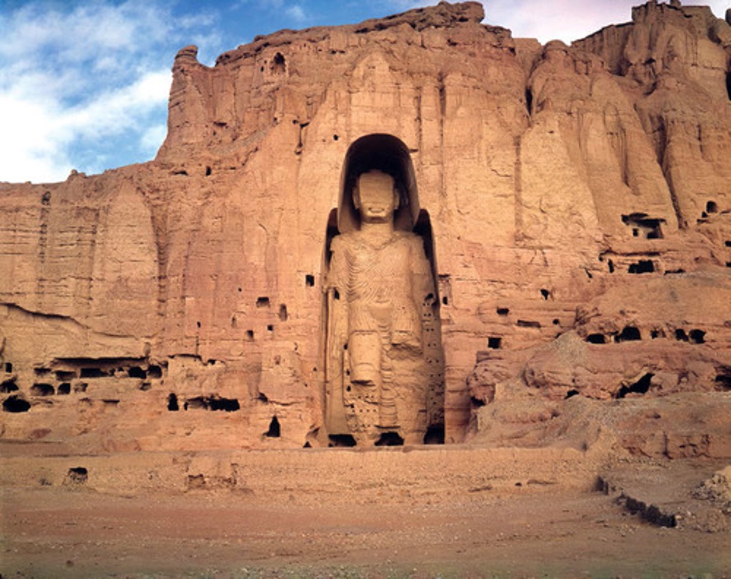 <p>Bamiyan, Afghanistan</p><p>Artist: Gandharan</p><p>c. 400-800 CE (destroyed in 2001)</p><p>Form: Cut rock with plaster and polychrome paint</p><p>Function: Part of Buddhist rituals and done primarily as a high relief.</p><p>The larger of the two, measuring 175 feet in height, was found on the west end of the valley. The Buddha on the east end was 120 feet tall. The sculptures were done primarily as a high relief and were still attached to the cliff wall in the back.</p>