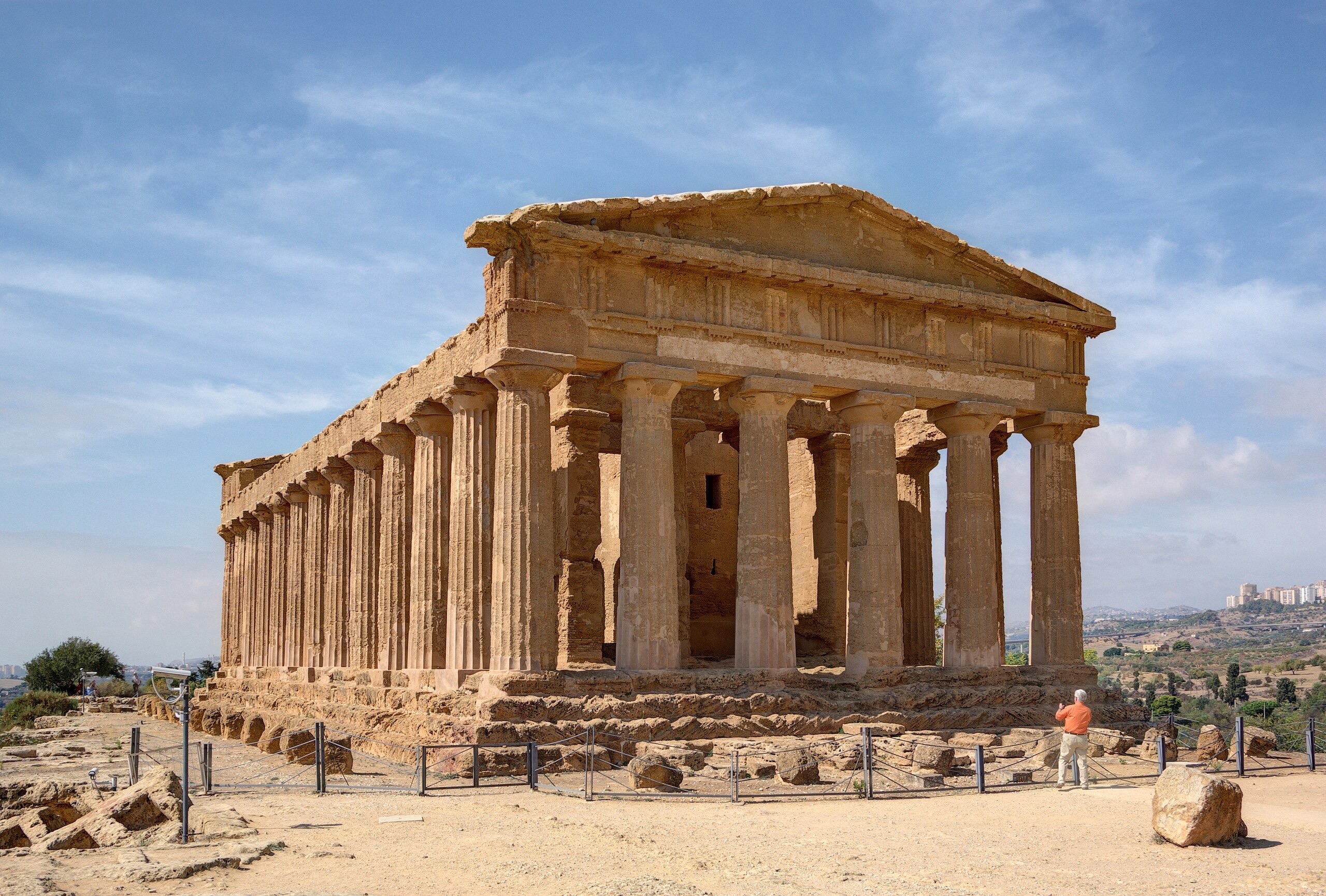 <p><span>A portico is essentially an open, roofed porch or colonnade with columns supporting the roof, leading to a building's entrance</span></p>