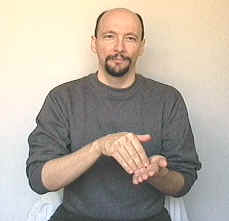 <p><span style="font-size: medium">bend your dominant hand at the large knuckles and then move your hand in a bit of an arc and touch the palm of your non-dominant (flat) hand with the fingertips of your (bent) dominant hand.</span></p>