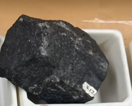 <p>Origin: extrusive </p><p>Texture: Aphanitic</p><p>Color: mafic&nbsp;</p><p>Cooling rate: fast&nbsp;</p><p>Special: looks like coal</p>