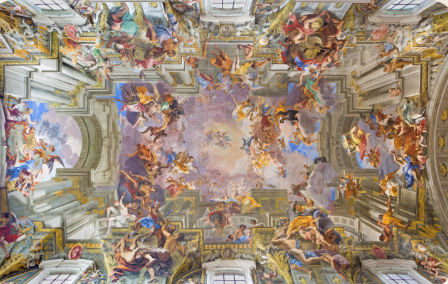 <p><span>An illusion of figures trying to crawl out from the painting space; portions of architecture blending with painting featuring a lot of gilding in Baroque.</span></p>