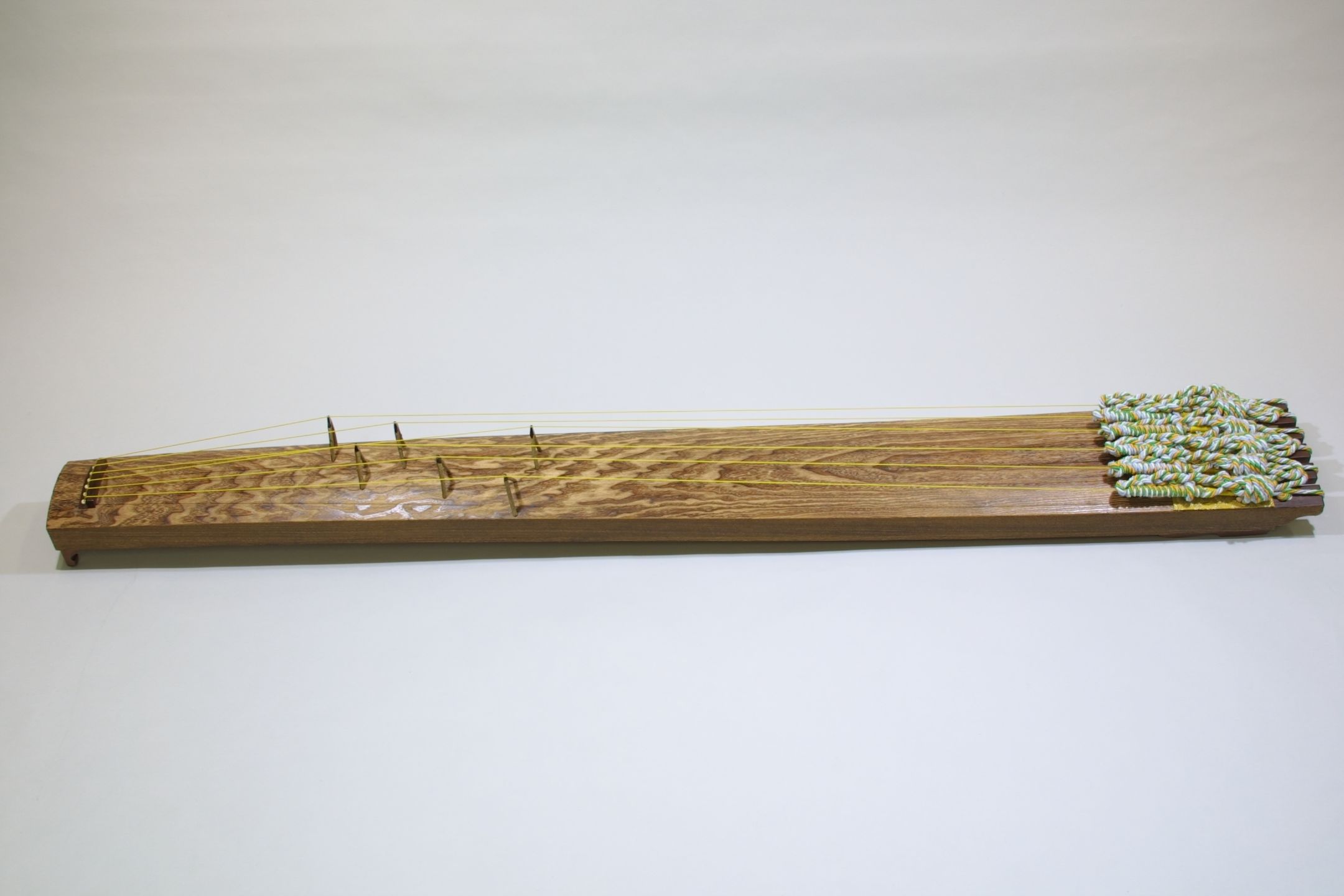 <p>The ______ is a ______-string koto with a ______ shape. It is a ______.</p>