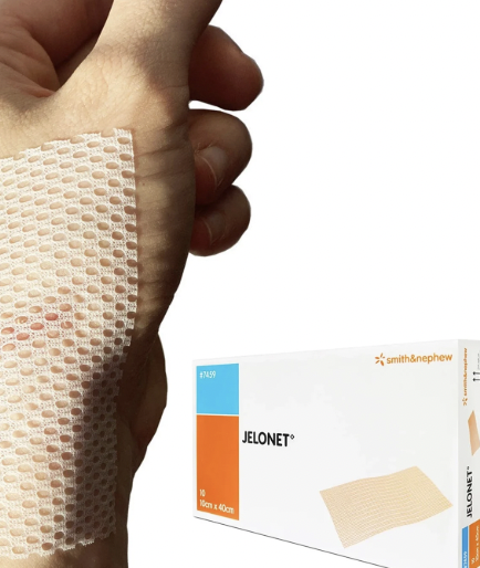 <p><u>Material:</u> Cotton net impregnated with soft paraffin (petroleum)</p><p><u>Indication:</u> Allows exudate to pass through to the secondary absorbent layer</p><ul><li><p>Ideal for skin grafts</p></li></ul><p><u>Disadvantages:</u></p><ol><li><p>Difficult to remove hydrophobic paraffin</p></li><li><p>Excessive paraffin causes wound occlusion → fluid accumulation → inhibits epithelialisation</p></li></ol><p></p>
