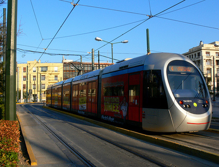 <p><span>an </span>electric<span> </span>vehicle<span> that </span>transports<span> </span>people<span>, usually in </span>cities<span>, and goes along </span>metal<span> </span>tracks<span> in the </span>road</p>