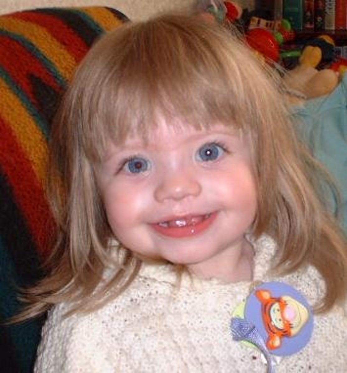 <p>Elfin-appearance, friendly, increased empathy and verbal reasoning ability.</p>