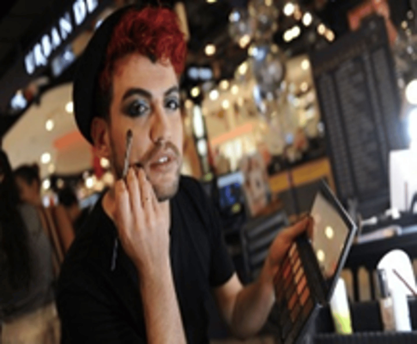<p>to put on makeup</p>