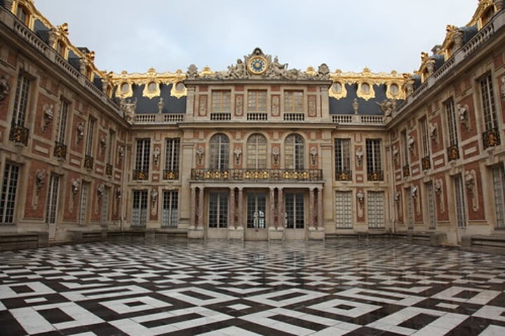 <p>Palace constructed by Louis XIV outside of Paris to glorify his rule and subdue the nobility; late 17th-early 18th century (became his primary residence around 1670)</p>