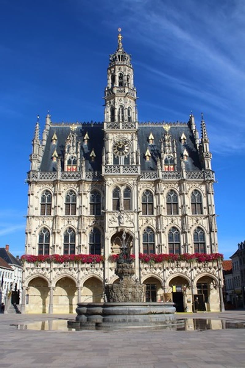 <p>was built by Hendrik van Pede in the flamboyant gothic style.</p>