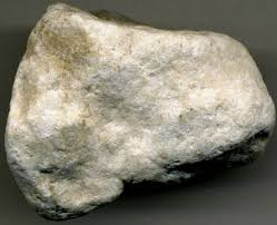 <p>Sedimentary, not made of other rocks, looks like crystals, scratched by fingernail</p>