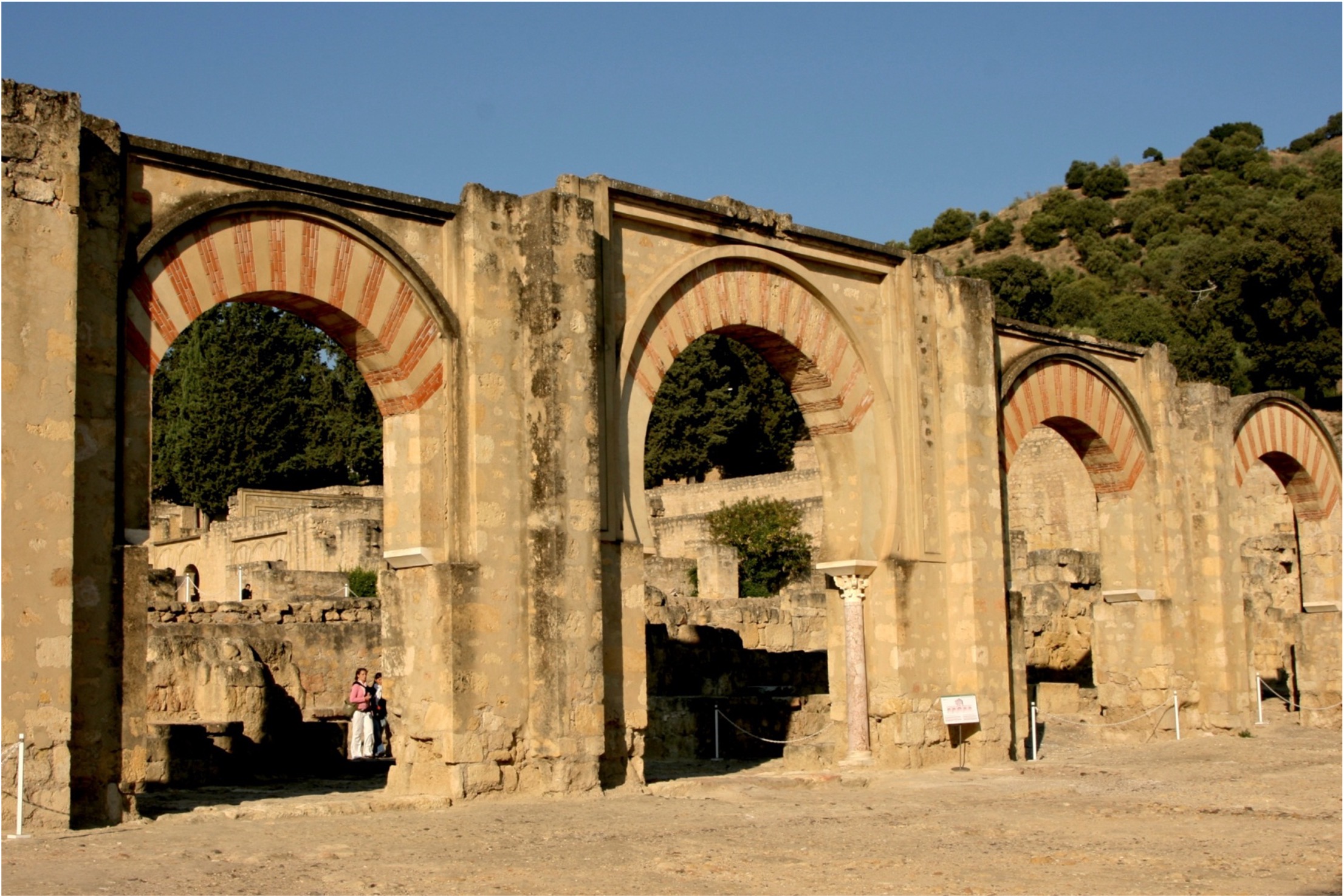 <ul><li><p>The city-palace was built on three large terraces, with extensive gardens</p><ul><li><p>The relationship between gardens and Paradise is emphasized in Spanish Umayyad poetry</p></li></ul></li><li><p>Massive retaining walls were built to create the terrace gardens</p></li><li><p><strong>Entrance to the Court of the Viziers – echoing the style of the Great Mosque of Cordoba</strong></p></li><li><p>More refinement – the horseshoe arches are more recurved, the circular arch above them swells upward – intricate stucco filigree work decorates everything</p></li><li><p><span style="font-family: Aptos, sans-serif"><strong>Interior of the caliph’s audience hall – with Visigoth spolia again (columns) </strong></span><span><strong>= </strong></span><span style="font-family: Aptos, sans-serif"><strong>shows conquest of the Visigoths in this context</strong></span></p></li></ul><p></p>