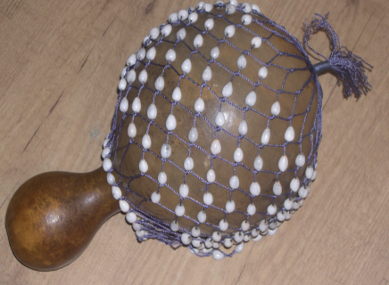 <p>is a beaded handmade rattle.</p><ul><li><p><strong>Agbe</strong> a very large beaded calabash traditionally owned and played by professional musicians in Nigeria.</p></li></ul>