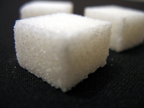 Disaccharide sugar, they do not have an enzyme to break the sugar into monosaccharides.