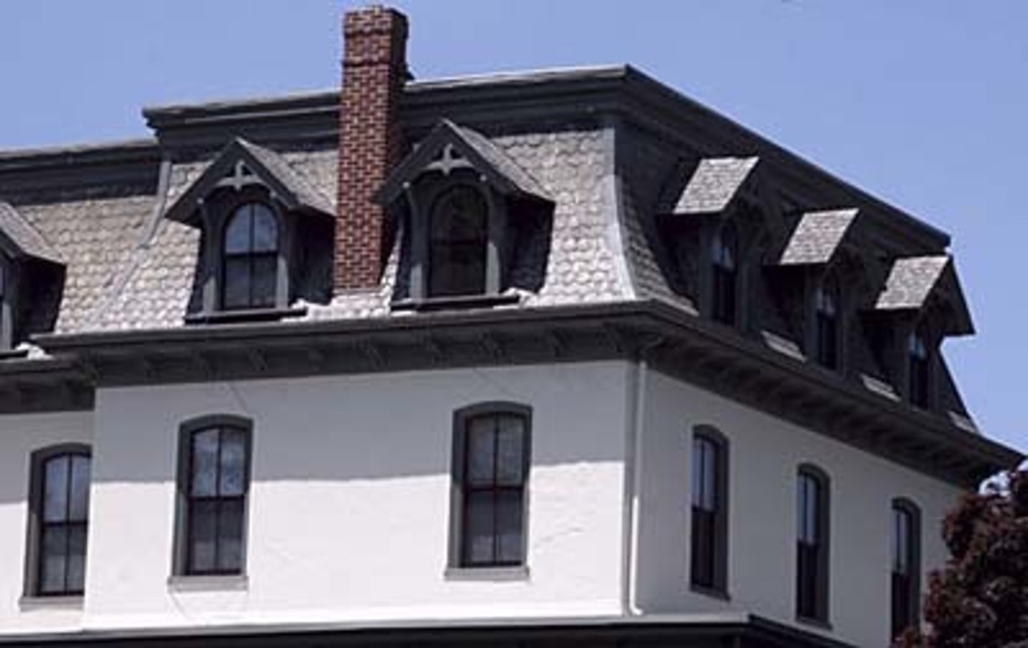 <p>The roof combines two different pitches below the ridge. Named for French Architect Francois Mansard</p><p>Widely used by Paris architects in the 17th Century. Creates more space on the top floor</p>