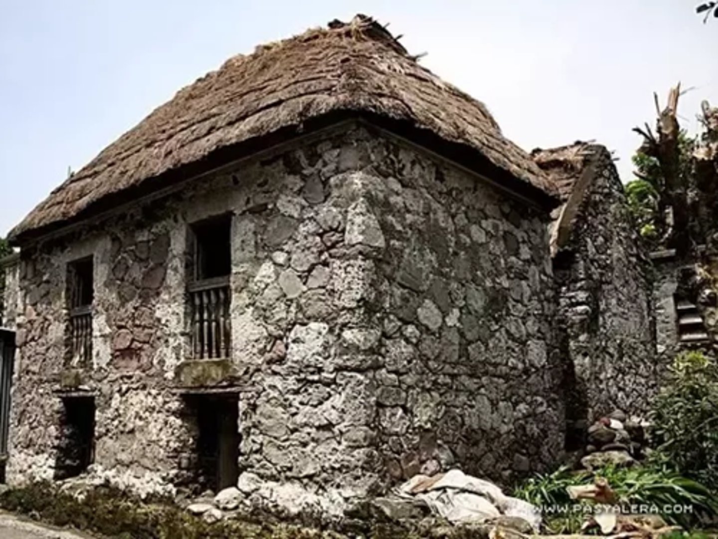 <p>Ivatan traditional house of stone and mortar, 1 1/2 m thk stick cogon thatch roof and a big roof net "panpet" to protect its dwellers against strong rains and winds</p>