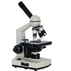 microscope that allows light to pass through a specimen and uses two lenses to form an image