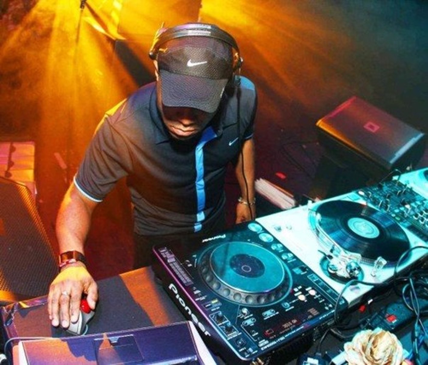 <p>A disc jockey. Also, someone who samples and mixes prerecorded sounds to make dance music.</p>