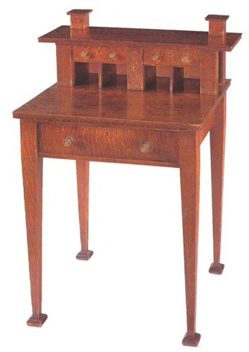 <p>Oak writing desk with brass fitings<br>considered to be the first piece of arts &amp; crafts furniture<br>legs have protection for when being moved<br>was in a publication seen by Gustav Stickley and Elbert Hubbard</p>