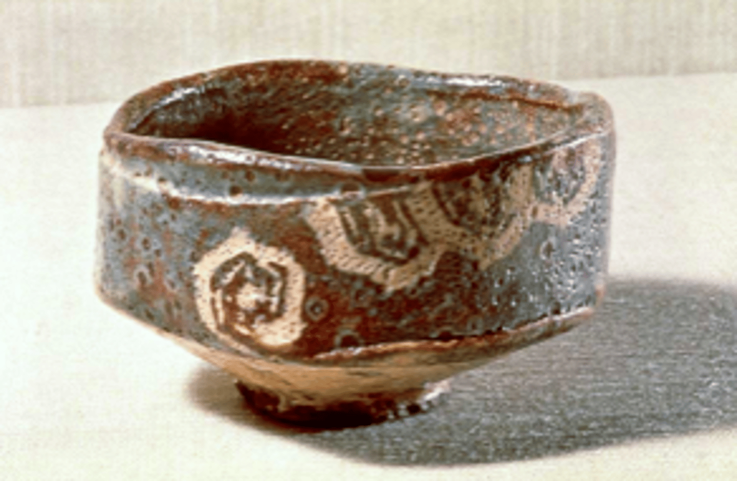 <p>The <span class="bgY">height of Japanese ceramic art</span>. Shaped by hand; its i<span class="bgY">rregular forms</span> follow a prescribed aesthetic of <span class="bgY">asymmetry</span>. Glaze crackles under thermal shock. Known for its <span style="text-decoration:underline">rugged shapes</span> and soft, somber lead glazes that sometimes drip downward in globs.</p>