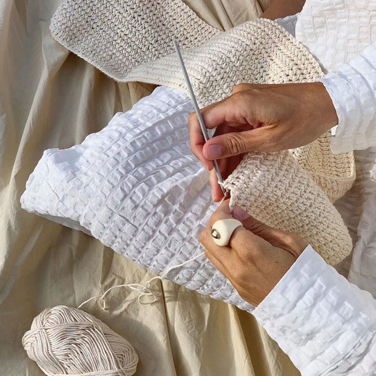 <p>She <strong>crochets</strong> small toys.</p>