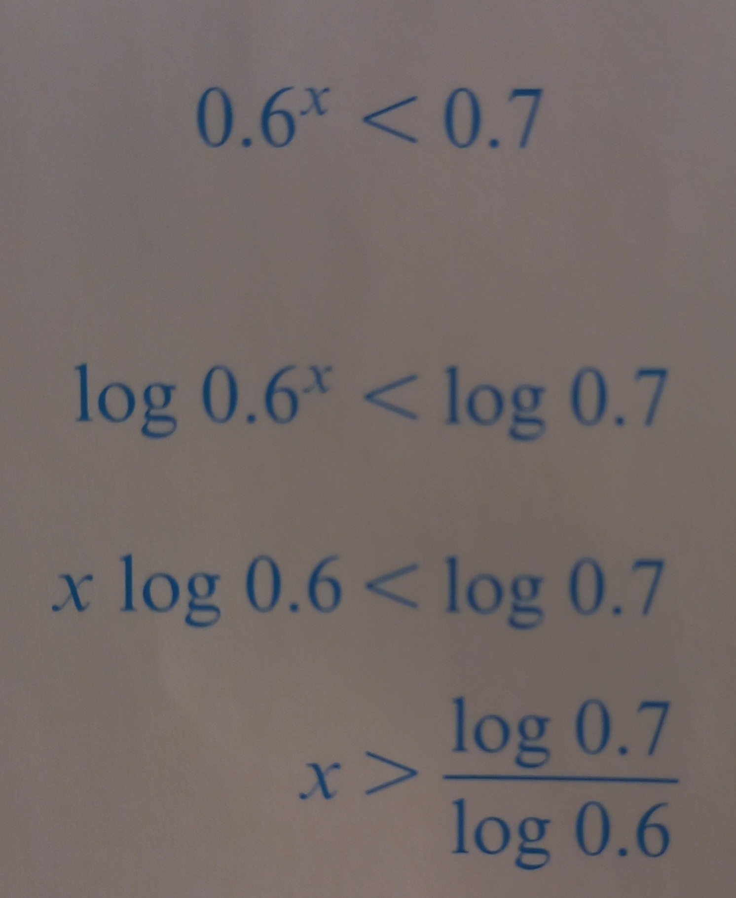 <p>When we divide with a negative number, or in this case, when log is between 0 and 1. </p><p>Look at the following example, log 0.6 is a negative number, so the sign changed from &lt; to &gt;.</p>