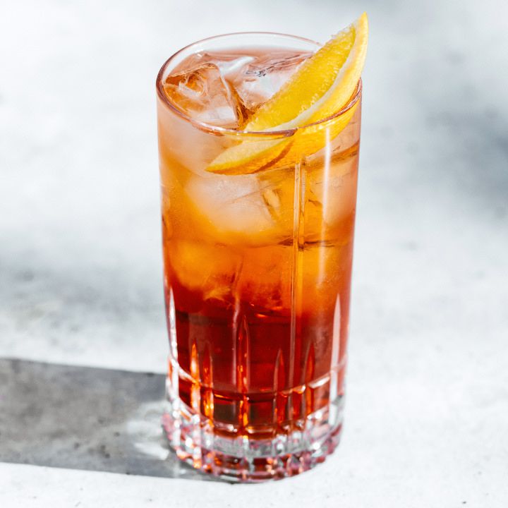 <p>negroni, 1 oz sweet vermouth, 1 oz Campari, top soda water, served on the rocks, garnished with orange peel</p>