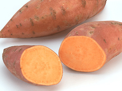 typically long and narrow with points on each end. They range from a brown-red-deep red color, as pictured. The skin is thin and has a russet, with dots/ eyes overlapping. The inside of sweet potatoes is yellow-orange. As the name may suggest, these potatoes are sweet.
