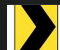 Warning sign: Chevron (arrow) sign

\
